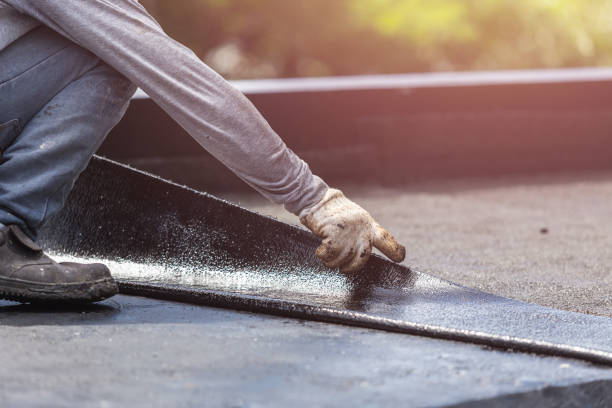Professional Emergency Waterproofing technician working in Spring Lake, MI